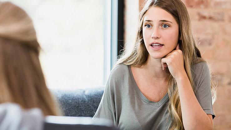 Two female students in discussion